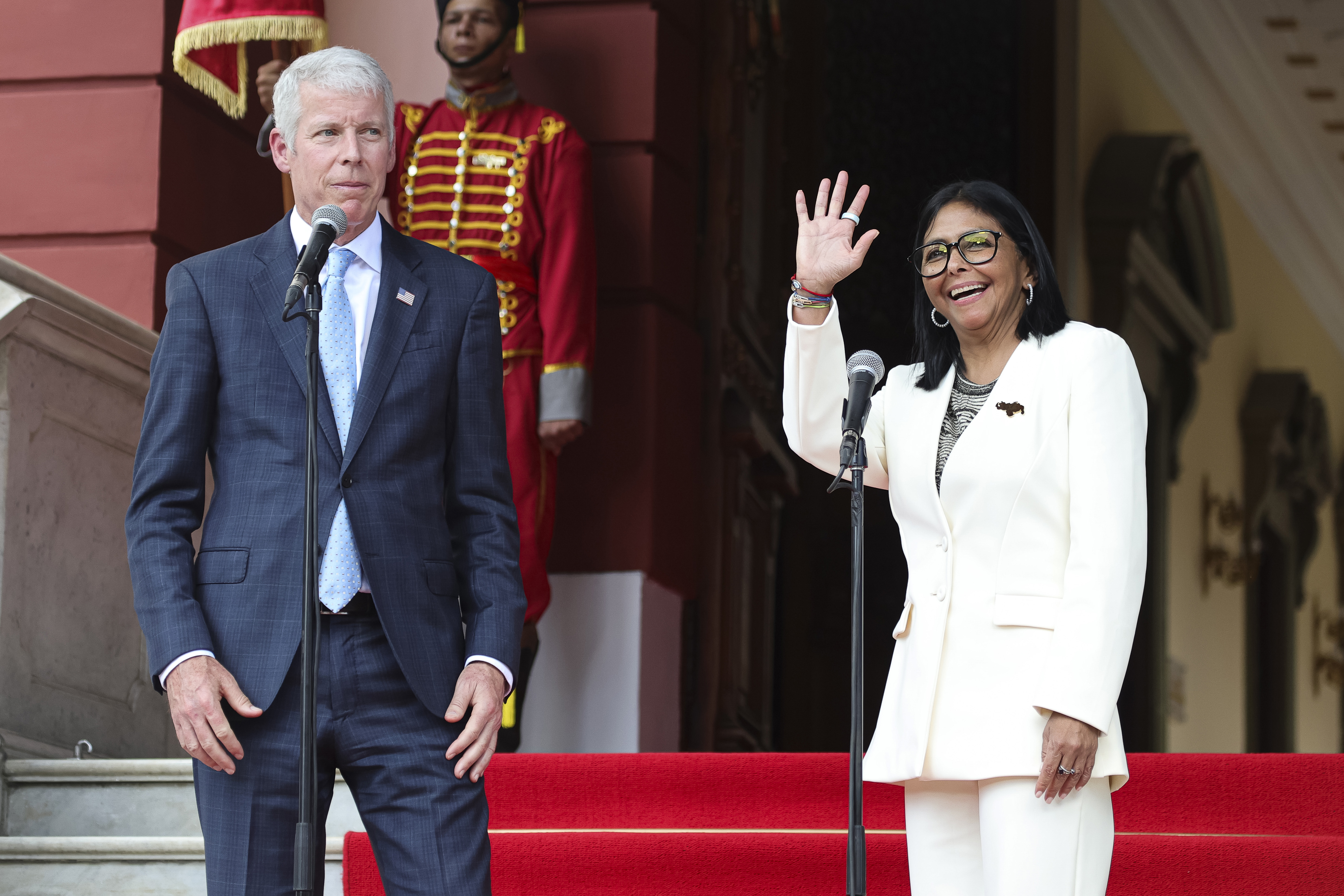 CARACAS, VENEZUELA - SEPTEMBER 2: (L-R) U.S. Secretary of Energy Chris Wright and Venezuela's interim president Delcy Rodríguez gesture during a press conference regarding the oil agreement reached by the US government and Venezuela on September 2, 2026 in Caracas, Venezuela. According to the agreement, the United States government will gain control over 65 billion barrels of proven oil reserves in Venezuela, representing investments on infrastructure up to US$100 billion, as well as tax revenue for the Venezuelan government of approximately US$200 billion over the first 25 years. (Photo by Jesus Vargas/Getty Images)