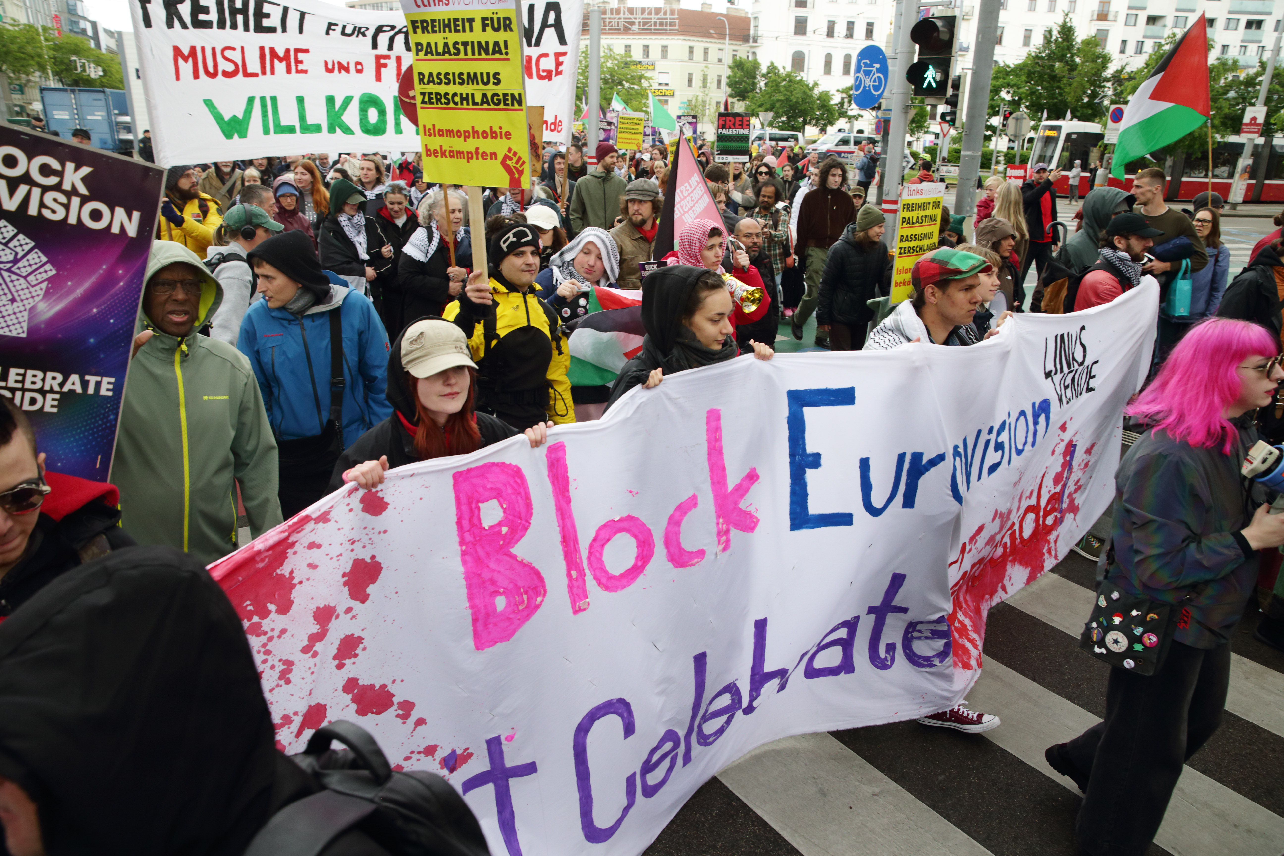 Pro-Palestinian and Iranian activists gather to demonstrate against Israel's participation in this year's Eurovision Song Contest on May 16, 2026 in Vienna, Austria
