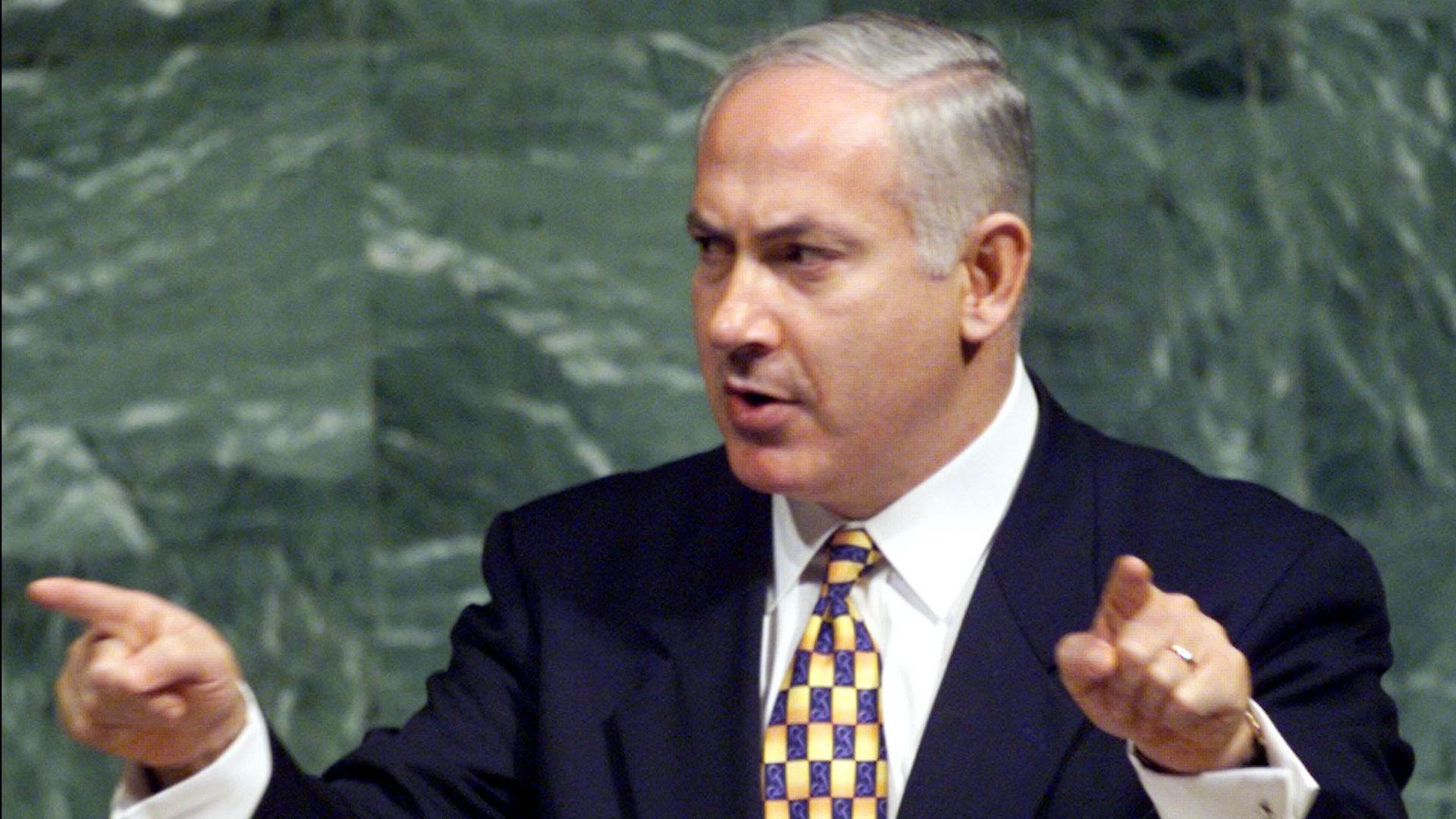 Israeli Prime Minister Benjamin Netanyahu addresses the 53rd session of the United Nations General Assembly at U.N. headquarters in New York, September 24, 1998. [Mike Segar / REUTERS]