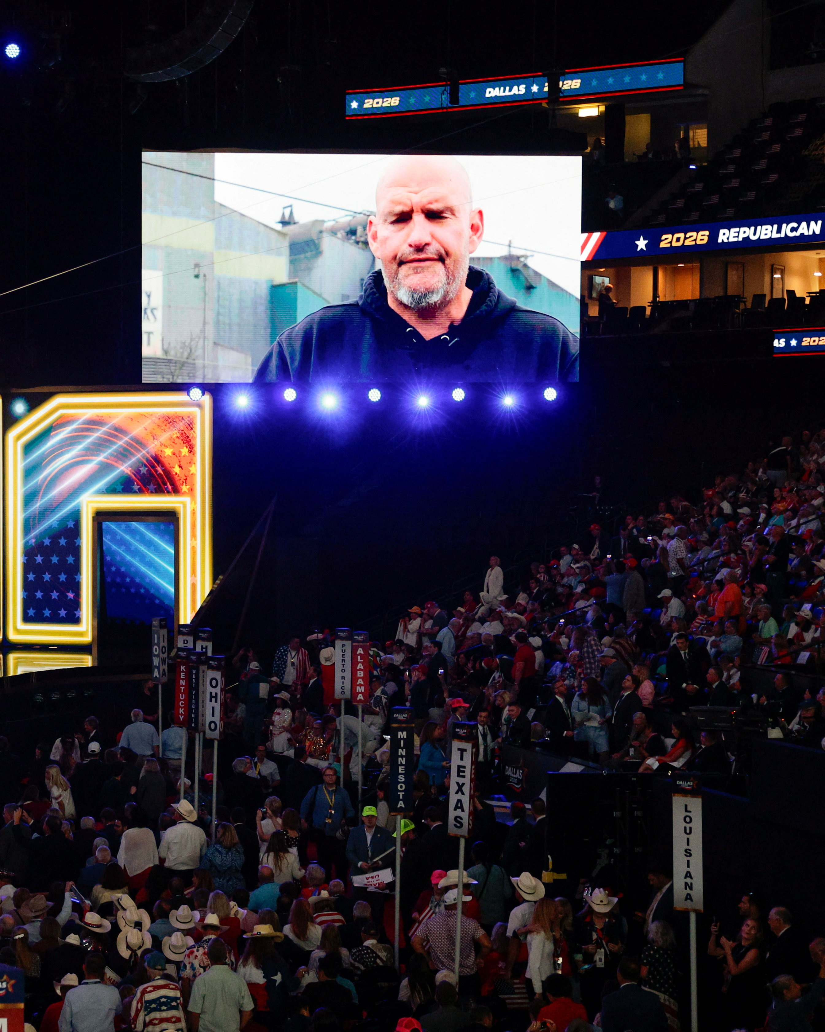 U.S. Senator John Fetterman (D-PA) appears via video to introduce U.S. Senator Dave McCormick (R-PA) during the Republican National Midterm Convention in Dallas, Texas, U.S., September 9, 2026. REUTERS/Brian Snyder