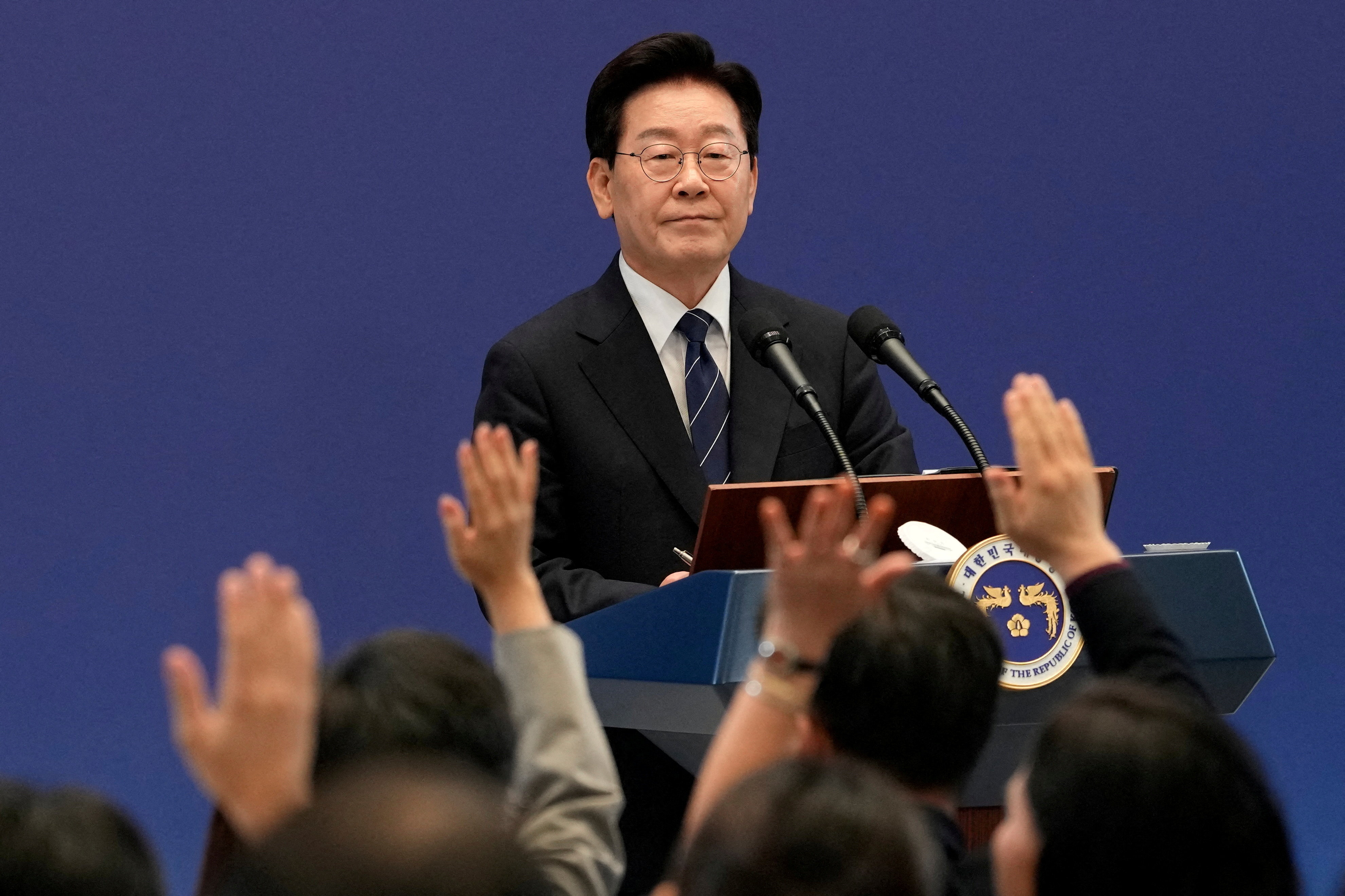 South Korean President Lee Jae Myung responds to questions from journalists.