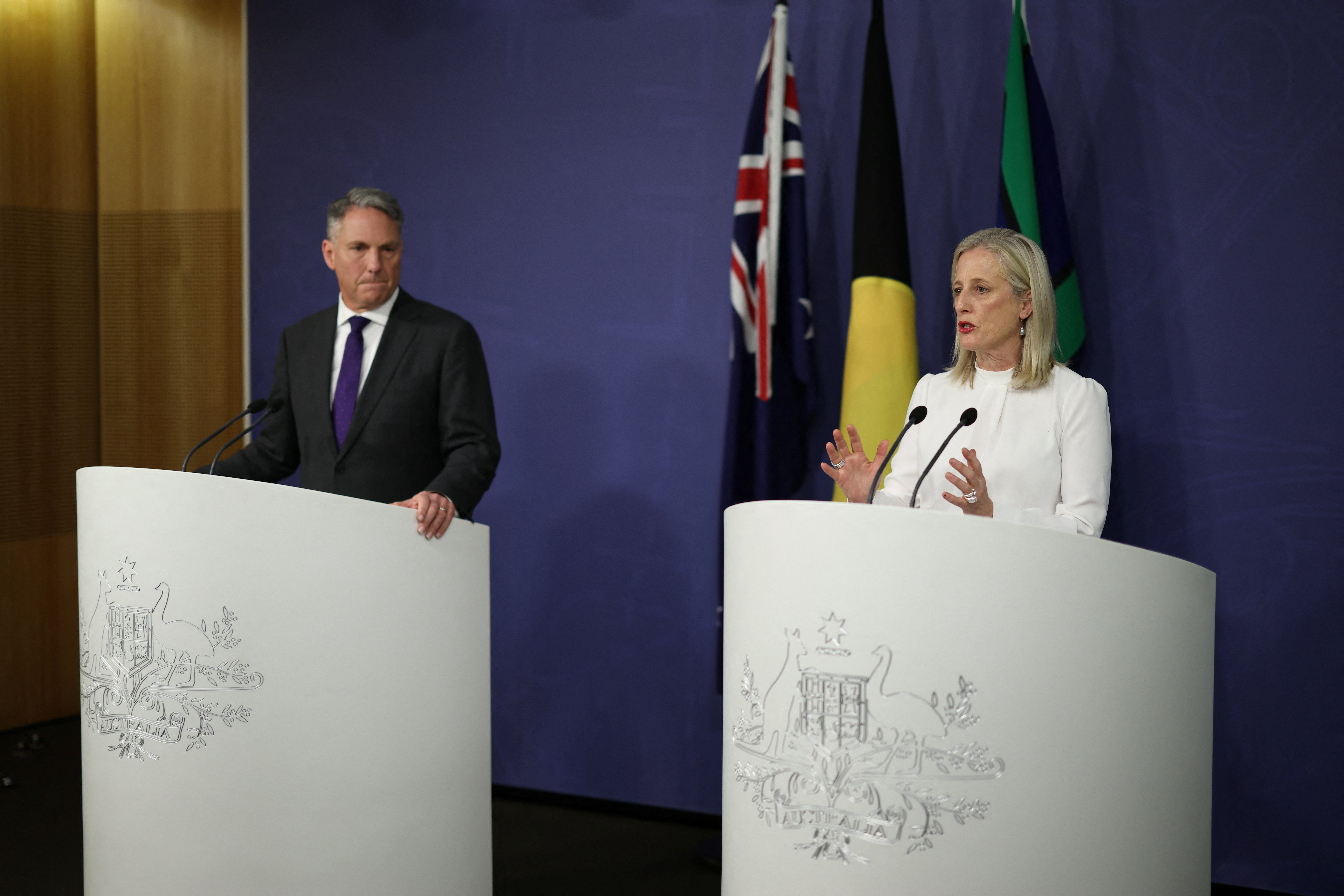 Australian Minister for Government Services Katy Gallagher speaks to the media alongside Australian Deputy Prime Minister and Defence Minister Richard Marles after it was revealed an AI agent developed by OpenAI infiltrated an Australian government website in June, in Sydney, Australia, September 24, 2026. REUTERS/Hollie Adams