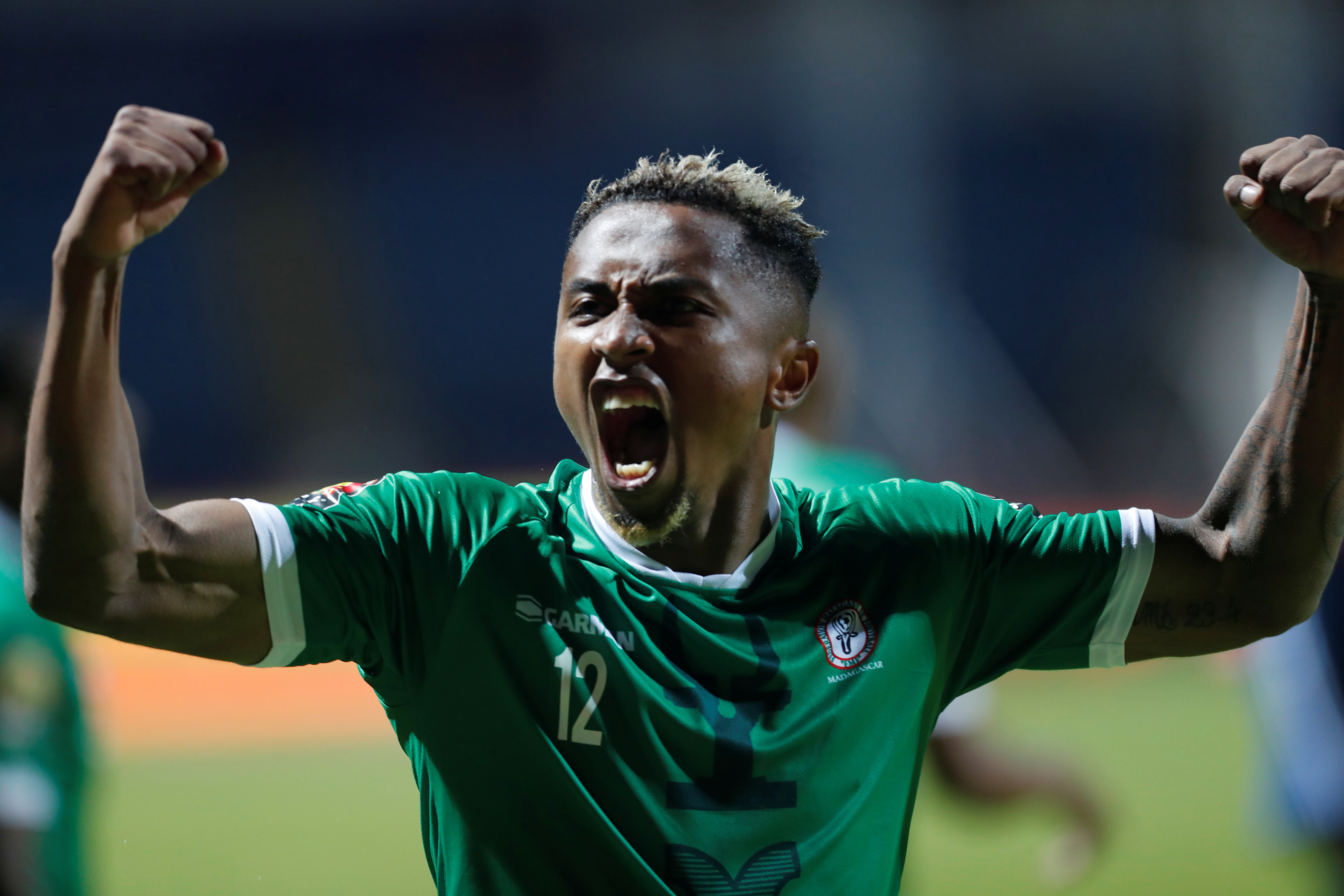 Soccer Football - Africa Cup of Nations 2019 - Round of 16 - Madagascar v DR Congo - Alexandria Stadium, Alexandria, Egypt - July 7, 2019 Madagascar's Lalaina Nomenjanahary celebrates after winning the penalty shootout REUTERS/Mohamed Abd El Ghany