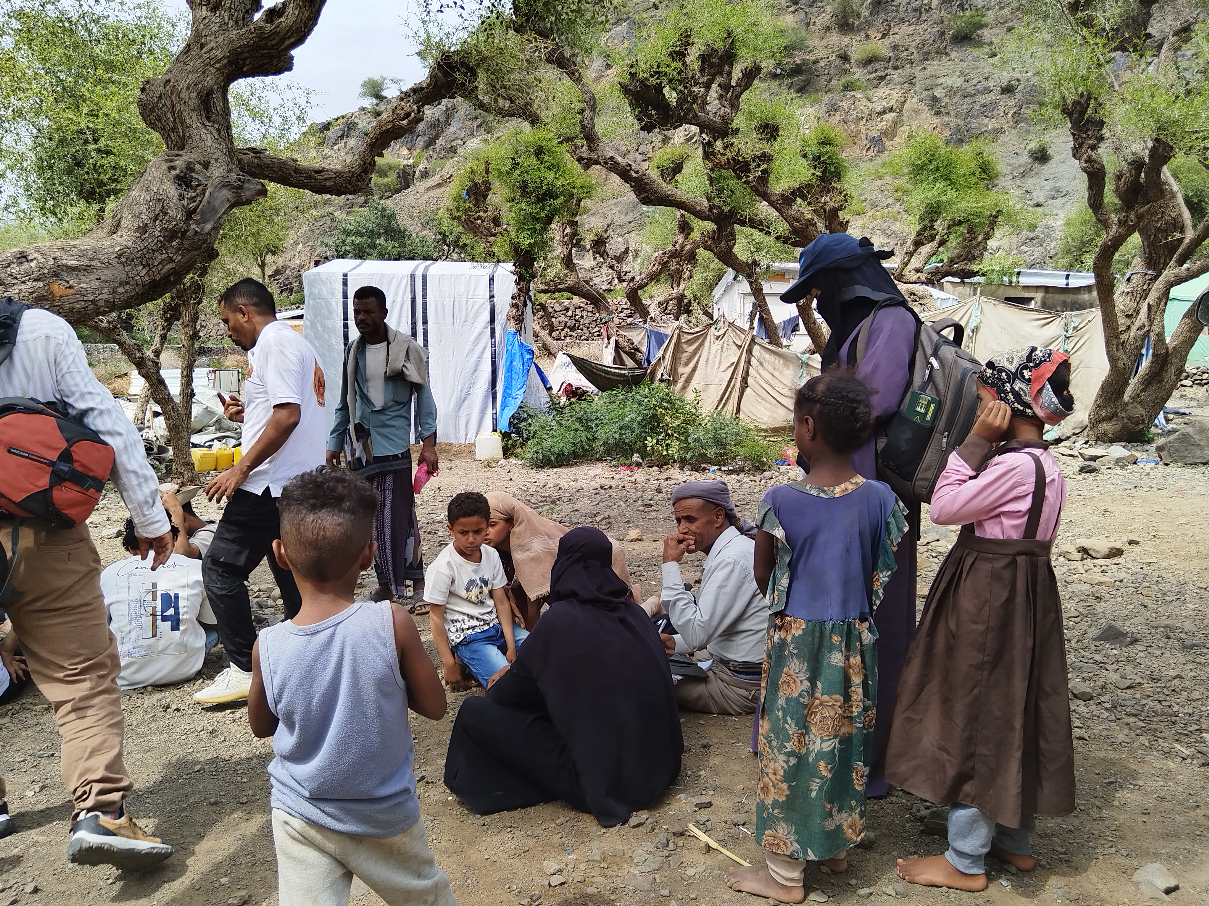 Newly displaced persons at Al-Munayyaj camp [Al Jazeera]
